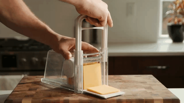 The Cheese Chopper from Shark Tank seems to over-complicate the proces