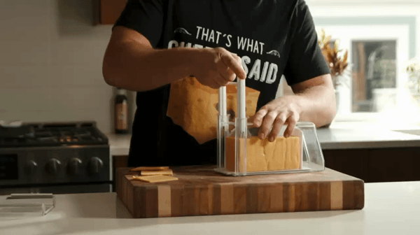 The Cheese Chopper from Shark Tank seems to over-complicate the proces